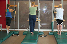 pilates austin trio tower mat class beginning position